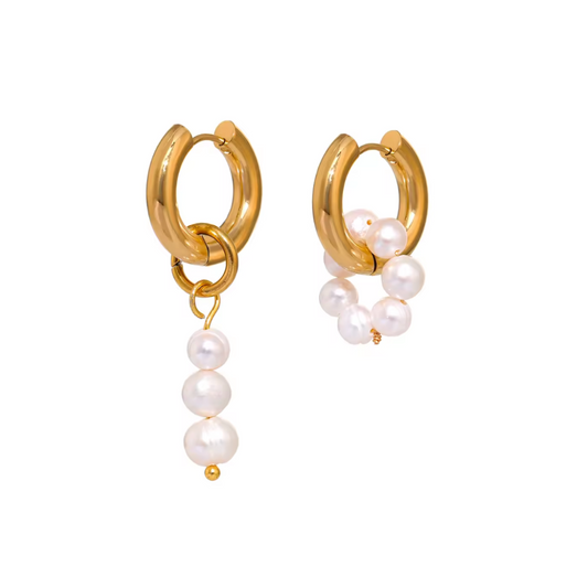 Gold hoop earrings with detachable freshwater pearls in an asymmetrical design. Elegant and versatile.