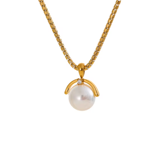 A gold stainless steel necklace featuring an elegant round simulated pearl pendant, with a tarnish-resistant finish for a timeless and versatile look.